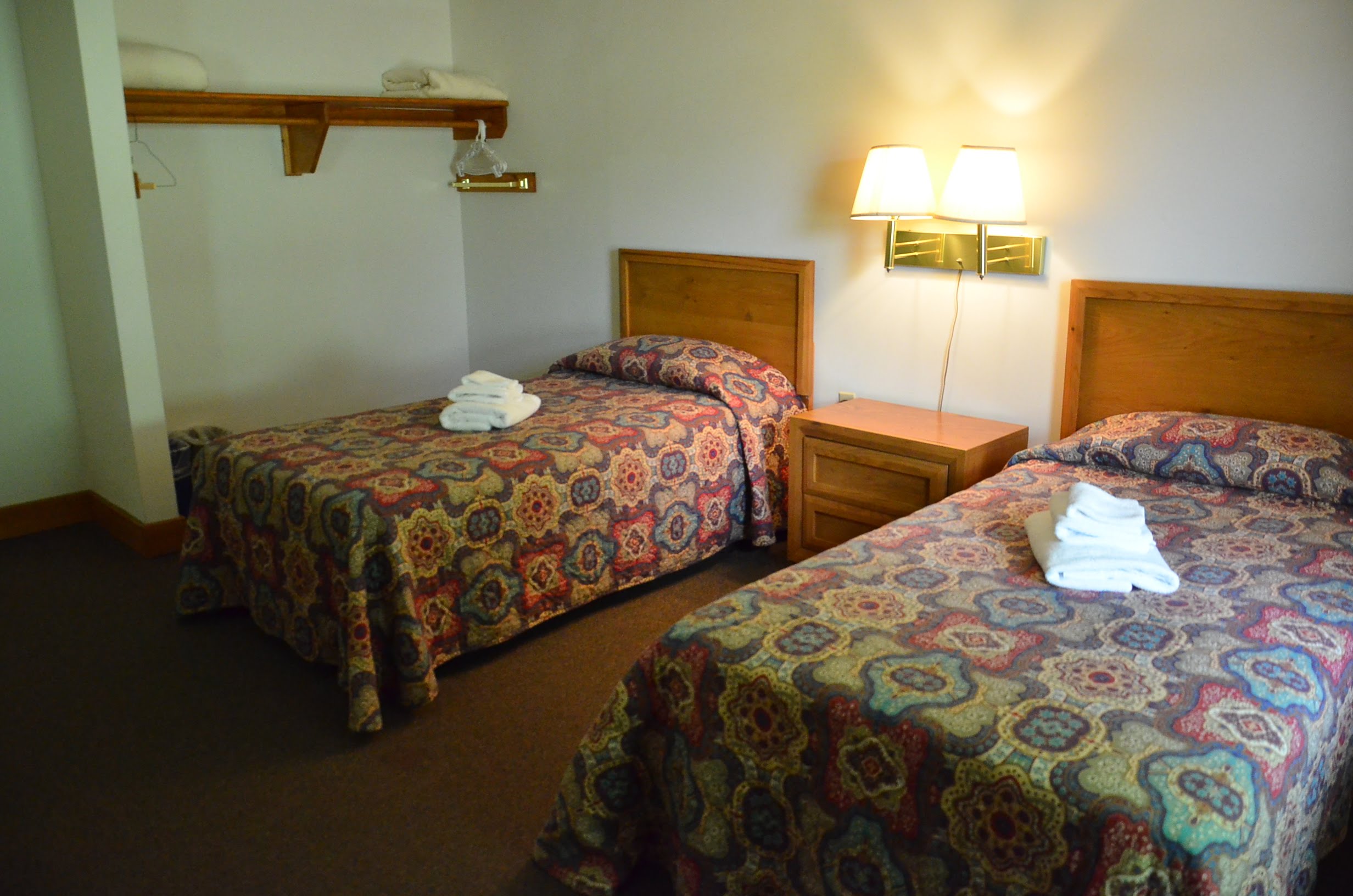Reynold's bedroom with two beds.